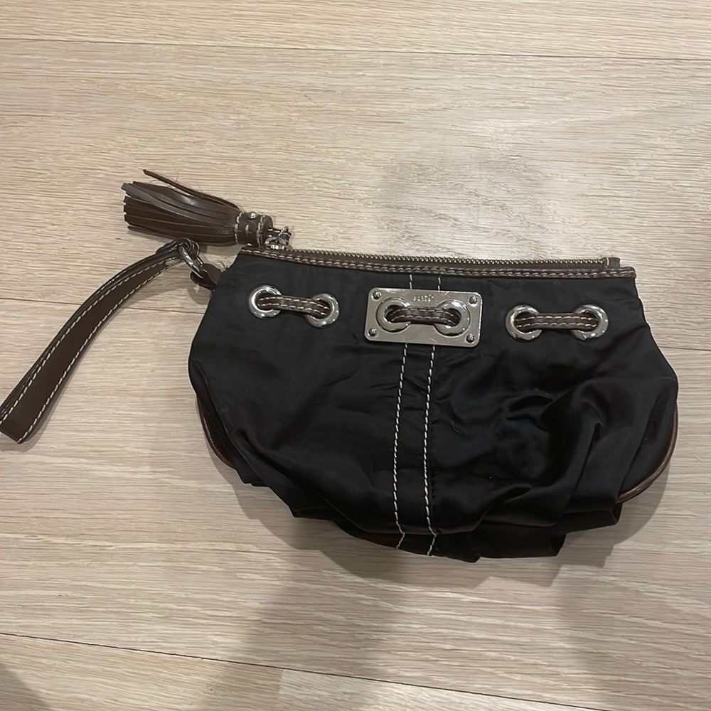 Rafé black Bak with brown leather details and silver hardware.